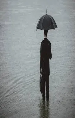 L'homme au parapluie fermé